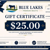A $25.00 gift certificate from Blue Lakes Premium Meats, featuring a cream background with navy blue ribbon graphics, a cow logo, and text indicating it can be redeemed for merchandise in the retail store.